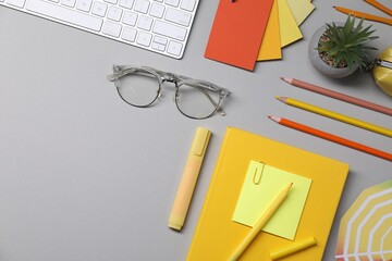 Poster - Designer's workplace. Flat lay composition with stationery and keyboard on light grey background, space for text