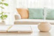 © Breezze - Tranquil Workspace with Notebooks and Aromatherapy Diffuser in Sunlit Room
