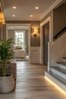 © JulieMeneghin - Photographie professionnelle d'un intérieur luxueux et chaleureux avec une chambre et des escaliers en bois clair, décorée avec goût