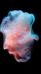 Poster - Creating an enchanting visual experience, pink and blue smoke swirls and dances on a black background, forming abstract shapes that evoke a sense of ethereal beauty and mystery