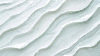Poster - Creamy white cosmetic product creating soft, flowing waves, forming an abstract and textured background perfect for beauty and skincare marketing, evoking a sense of purity and freshness