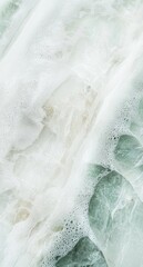 Poster - White foam gently covering a green and white marble surface creates an abstract and textured backdrop, evoking a spa-like aesthetic that embodies purity and relaxation