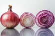 © Ishika - three red onions on a white background