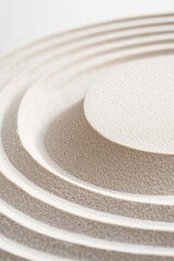 Poster - A close-up shot of a white circular object with no context or background