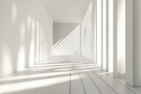 Sunlit white minimalist hallway with wood floor.