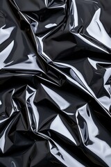 Wall Mural - a piece of plastic is folded and has a shiny surface