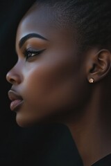 Aufkleber - A close-up profile of a person highlighting facial features and beauty.