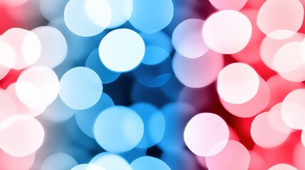Colorful bokeh lights on a dark navy background with vibrant pink and blue tones