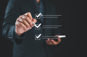 Poster - Checklist concept, Businessman checking mark on the check boxes with marker red, filling online form and answering questions. List options business employee security procedures followed office.