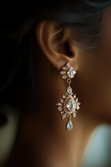 Poster - A close-up of elegant earrings featuring intricate design and sparkling gemstones.