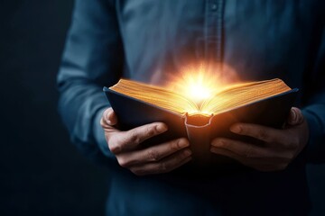 Poster - Law restriction control concept. Book glowing with light, held by a person.