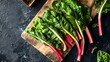 © Ahesan - Close up sliced Swiss chard on wooden board