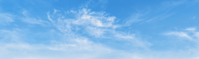 Wall Mural - clear blue sky with a few clouds
