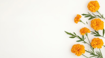 Poster - A cluster of vibrant orange marigold flowers with green leaves on a light background, creating a cheerful and fresh aesthetic.