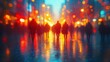 © logyartstudios - Blurry silhouettes of people walking on a rainy city street at night, with colorful bokeh lights reflecting on the wet pavement.