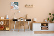 © Pixel-Shot - Workplace, sideboard and picture on wall in living room