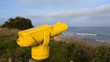 © OceanProd - tourist beach binocular touristic pay to view in modern yellow telescope in ocean coast horizon