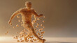 © Qaqas - Silhouette of a football player from the particles. The player consists of small circles.