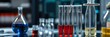 © Chalermrach - High tech laboratory setting with a pipette adding colorful fluid to a row of test tubes, experiment, high tech