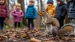 © Serhii - Children observe a curious squirrel in the forest during a nature exploration activity