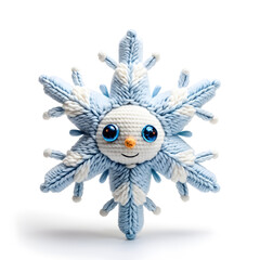 Wall Mural - A knitted soft toy in the form of a kind fairy-tale snowflake, made of woolen threads in blue and white tones. White background.