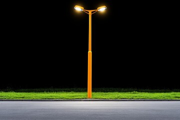 Leinwandbilder - A minimalist HDR composition of a glowing streetlight casting its golden light on empty pavement against a deep, dark background