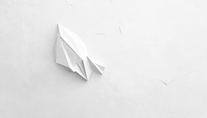 Poster - Minimalist White Paper Sculpture on Textured Wall Creating a Modern Artistic Atmosphere in Contemporary Interior Design
