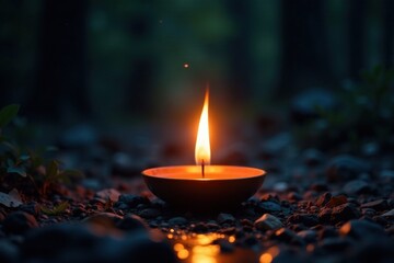 A single yellow flame casts a serene glow on the surrounding darkness, peaceful, soft, calmness