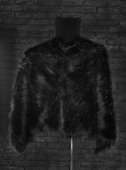 black fur coat on mannequin