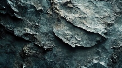 Poster - Textured dark stone surface with rough and uneven layers suitable for backgrounds and design projects