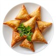 © warunthorn - Delicious Golden Fried Pastries Served on a White Plate with Herbs