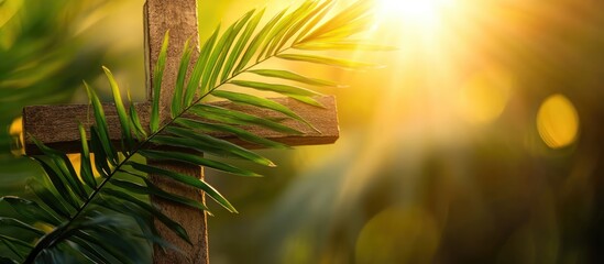 Aufkleber - Palm leaves resting on a wooden cross illuminated by sunlight symbolizing faith and renewal during a spiritual procession.