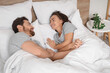 © Pixel-Shot - Morning of loving couple waking up in bedroom