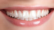 © kiattisak - bright, healthy smile showcasing white teeth and pink gums, reflecting good dental hygiene and care. This captures essence of confidence and well being