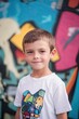© Zyra - Young Boy Smiling Against Colorful Urban Wall Art Background