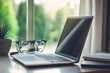 © atar - Modern Laptop on a Desk with a View. Concept of Work from Home, Remote Work, and Productivity.