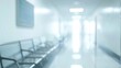 © bulegendut - Blurred hospital corridor with waiting chairs.
