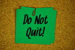 © may1985 - Do Not Quit! text message on stick note on cork paper background