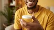 © 楠 刘 - Satisfied customer holding product with smile, product clearly visible in focus, conveying contentment and product satisfaction in modern consumer experience scene.