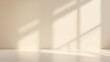 © Din Nasahrudin - Backdrop light beige podium display for product. Interior room with sunlight and shadows on beige concrete wall surface