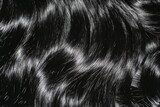 A hyper-realistic close-up of flowing black hair with individual strands illuminated, showcasing the intricate shine and texture under soft light
