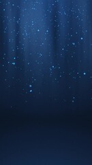 Poster - Blue glowing circles particles falling in the air and light rays at the top middle of a cyc wall background, vertical composition. Loop animation footage for graphic design.