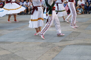 Wall Mural - Basque folk dance exhibition in an outdoor festival