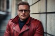© wiwat apisithpinyo - Confident Man in Red Leather Jacket