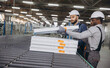 © anatoliycherkas - Factory workers assembling aluminum and pvc window frames on production line