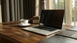 © Chandara - A minimalist workspace with a laptop, a cup of coffee, and a notebook on the desk.