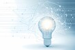 © possawat - Bright Light Bulb with Abstract Technology Background and Connections