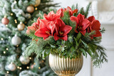 Beautiful Christmas arrangement with amaryllis flowers, green coniferous branches with a Christmas tree in the background
