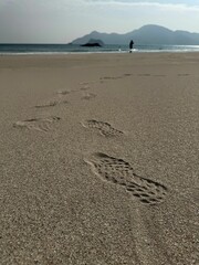 Poster - Footprints on a tranquil beach in Hong Kong