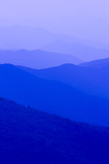 Wall Mural - the mountains are blue and the sky is clear